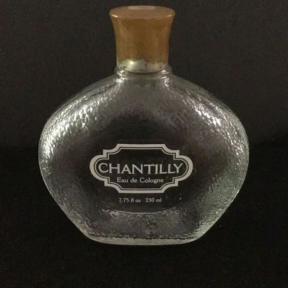 Perfume bottle, chantilly of new York 7.75 ounce bottle empty.